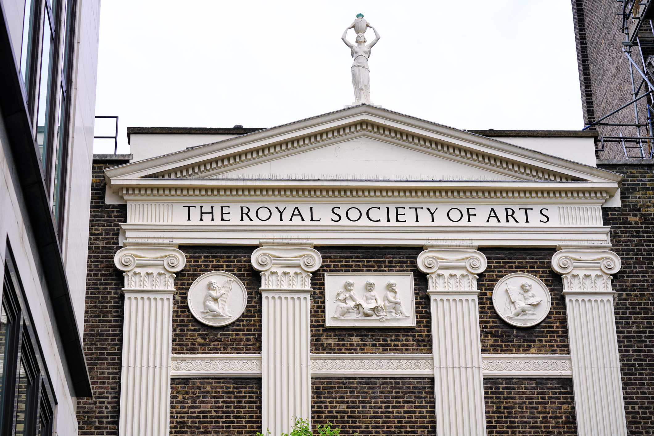 London, England, UK - 22 April 2025: The Portland stone facade of the Royal Society of Arts (RSA) building located off The Strand Street, near Charing Cross and Covent Garden.