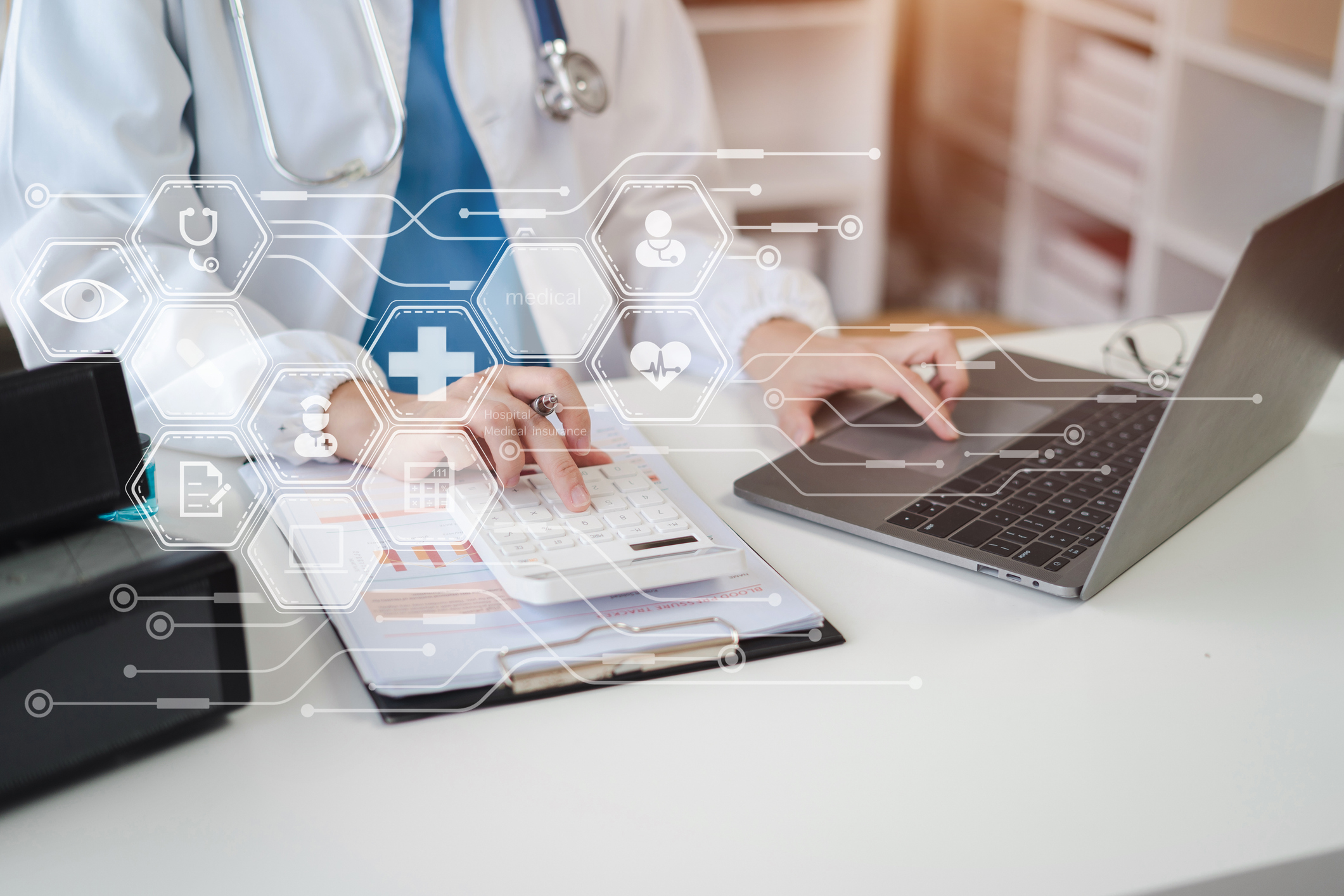 Doctor working in hospital use calculator, Healthcare and medical concept.