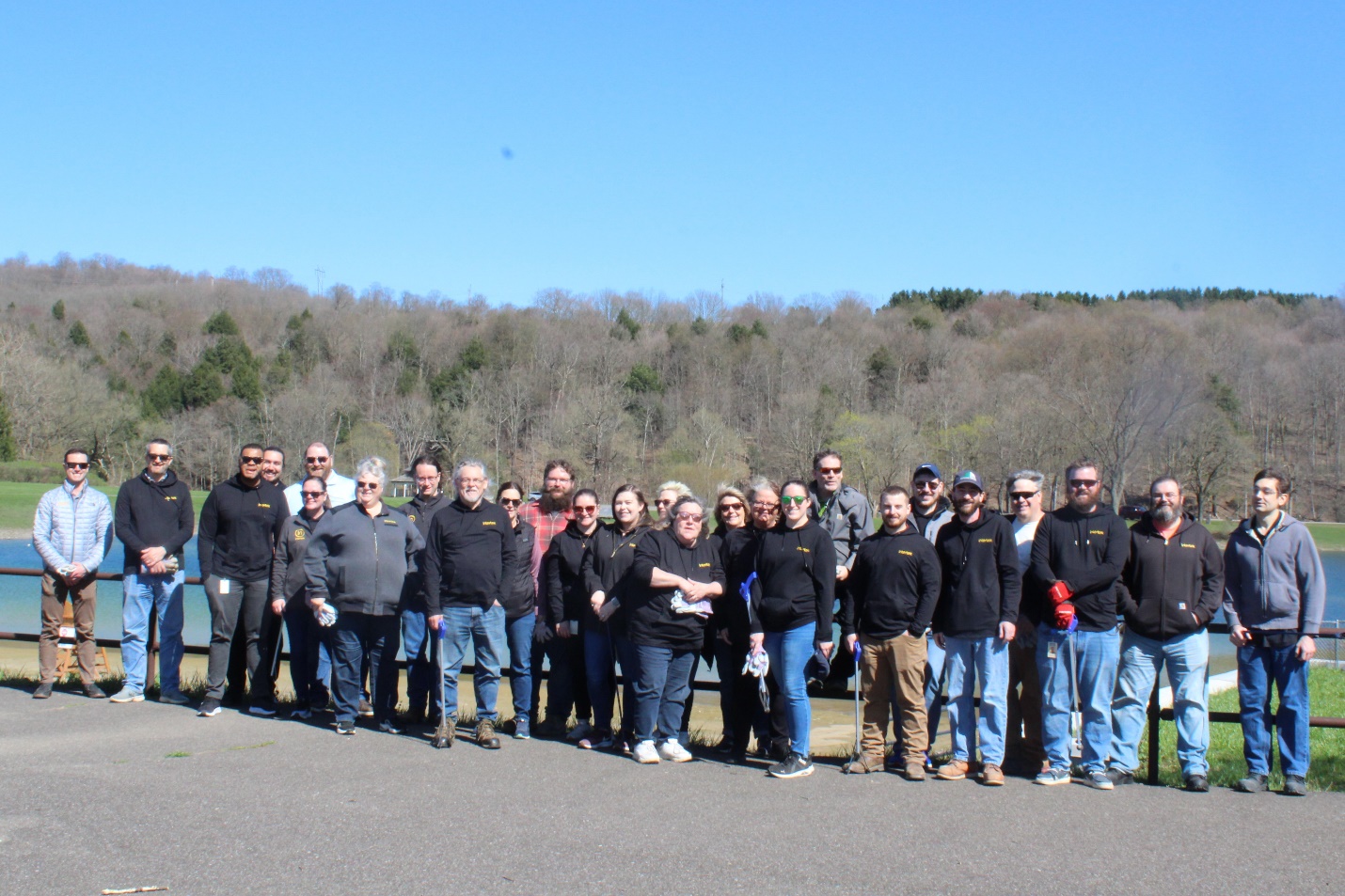 A group of people posing for a photo

Description automatically generated