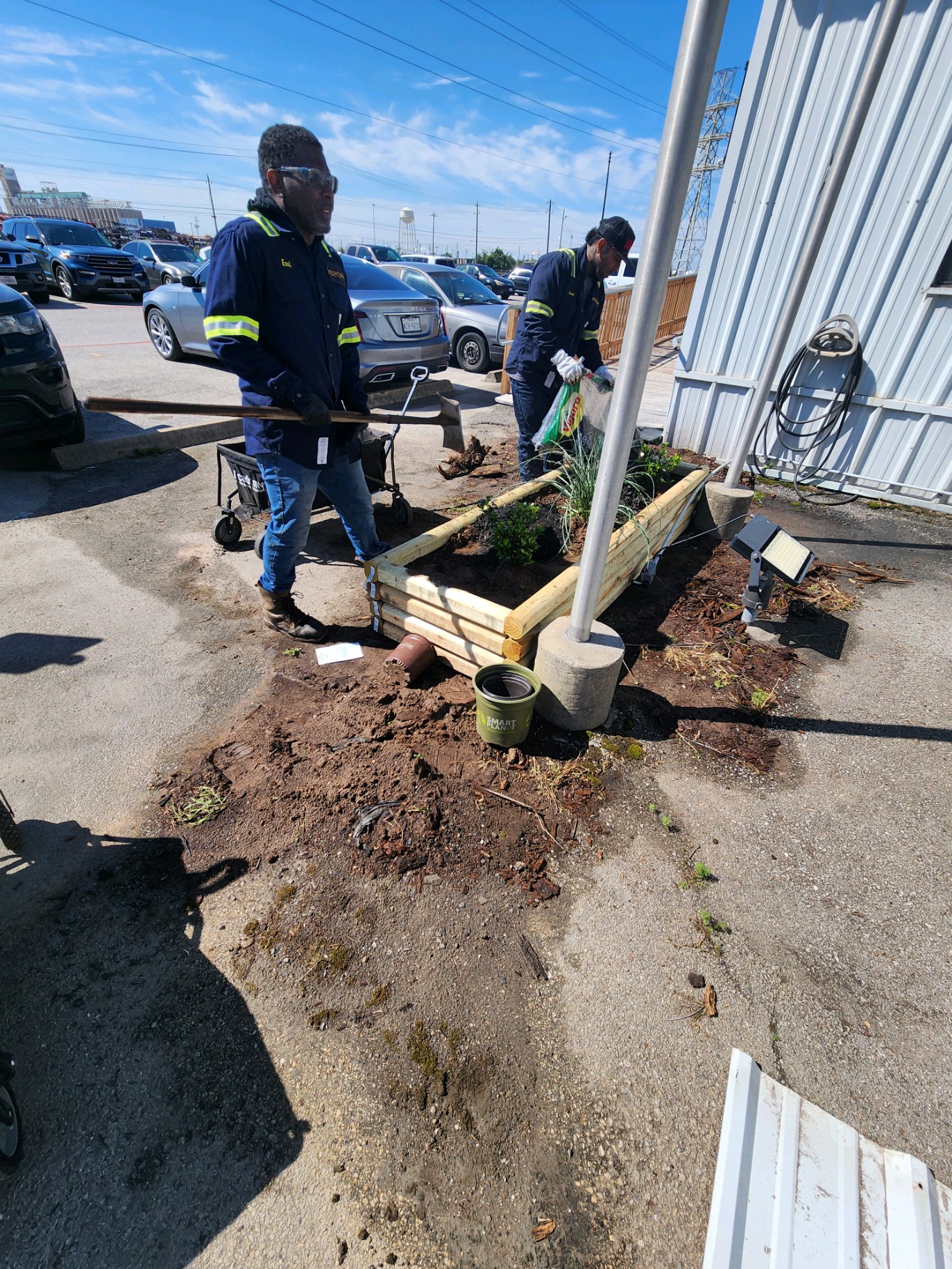 A group of men outside

Description automatically generated