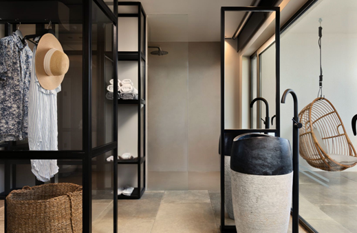 A bathroom with a sink and shelves
AI-generated content may be incorrect.