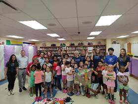 A group of people posing for a photo

AI-generated content may be incorrect.