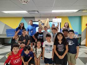 A group of people posing for a photo

AI-generated content may be incorrect.